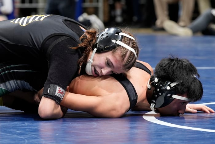 Reanah Utterback elected to wrestle with the boys instead of newly sanctioned IGHSAU girls wrestling.